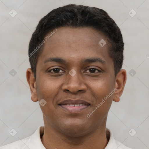 Joyful latino young-adult male with short  brown hair and brown eyes