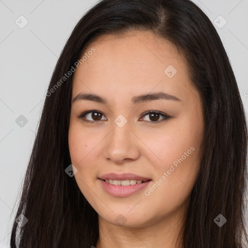 Joyful asian young-adult female with long  brown hair and brown eyes