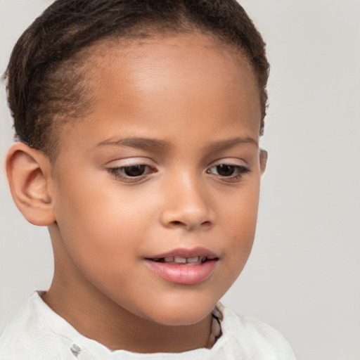 Joyful white child female with short  brown hair and brown eyes