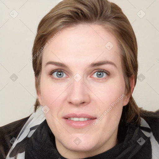 Joyful white young-adult female with medium  brown hair and blue eyes