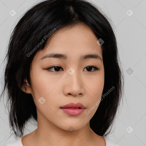 Neutral asian young-adult female with medium  black hair and brown eyes