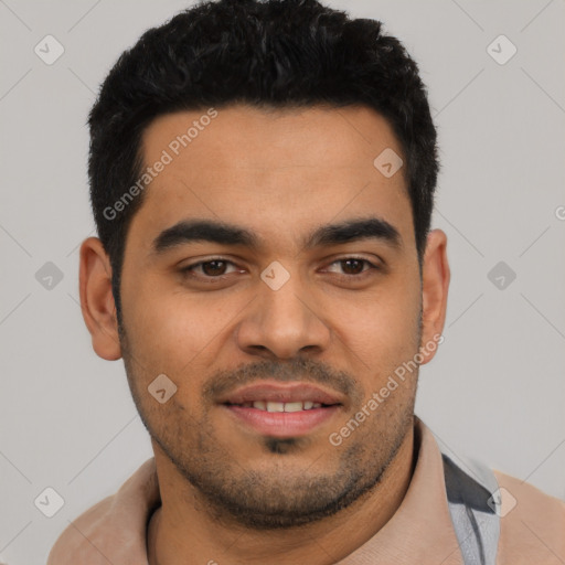 Joyful latino young-adult male with short  black hair and brown eyes