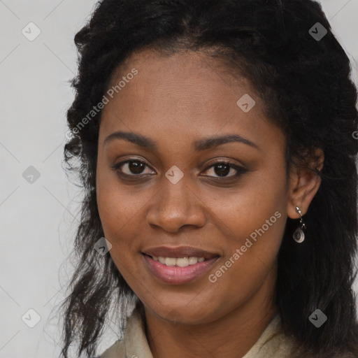 Joyful black young-adult female with long  brown hair and brown eyes