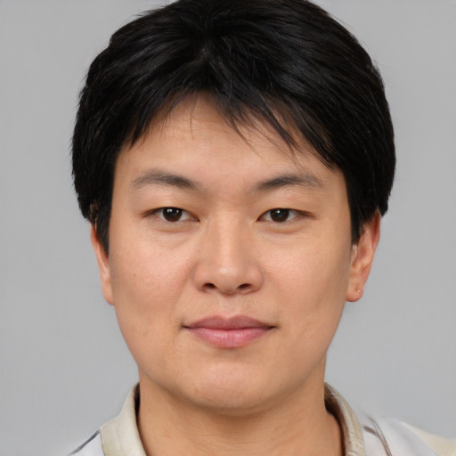 Neutral asian young-adult female with short  brown hair and brown eyes