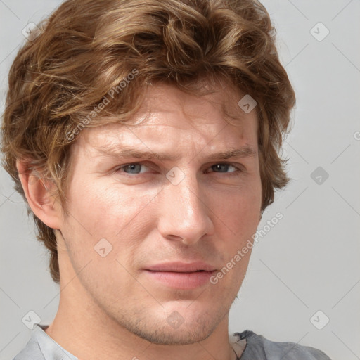 Joyful white adult male with short  brown hair and grey eyes