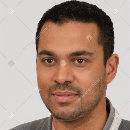 Neutral white young-adult male with short  black hair and brown eyes