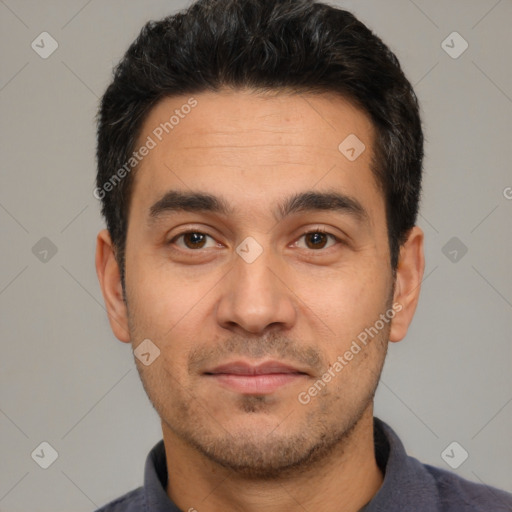 Joyful white young-adult male with short  black hair and brown eyes