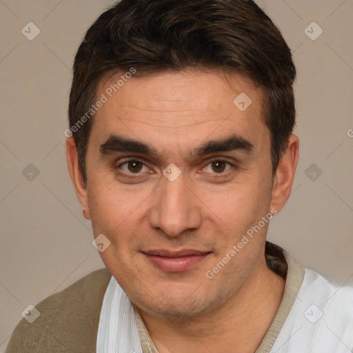 Joyful white adult male with short  brown hair and brown eyes