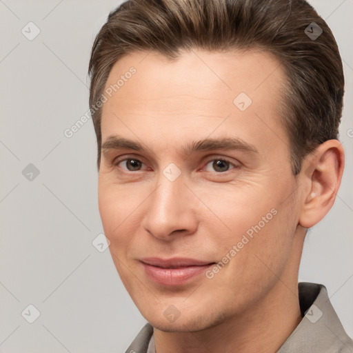 Joyful white young-adult male with short  brown hair and brown eyes