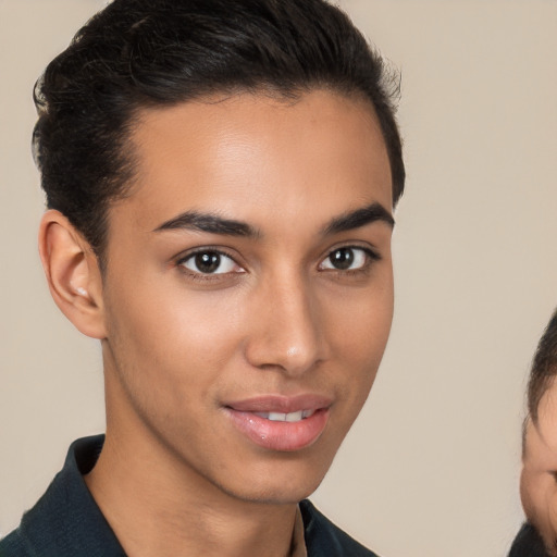 Joyful latino young-adult female with short  brown hair and brown eyes