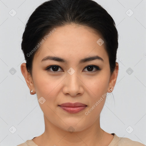 Joyful asian young-adult female with medium  brown hair and brown eyes