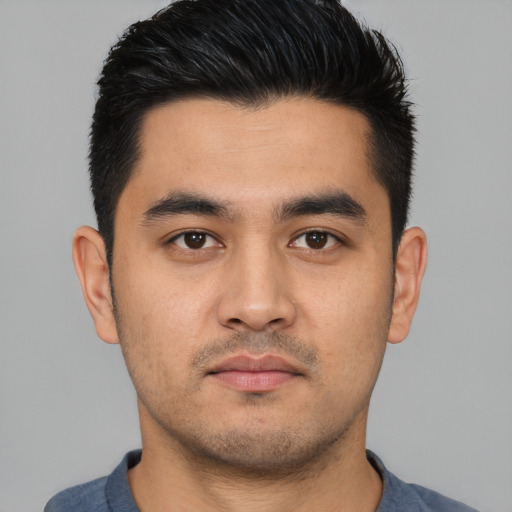 Neutral white young-adult male with short  black hair and brown eyes