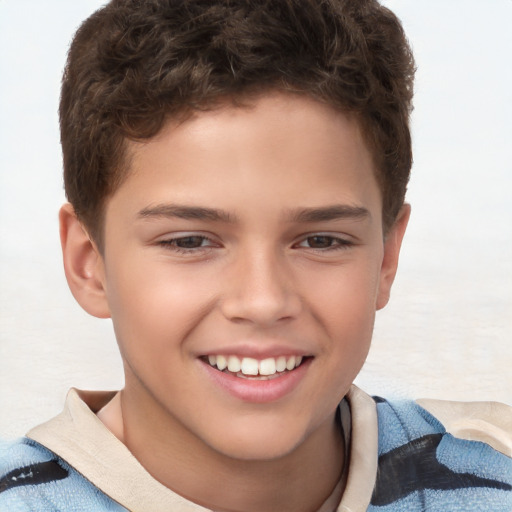 Joyful white child male with short  brown hair and brown eyes