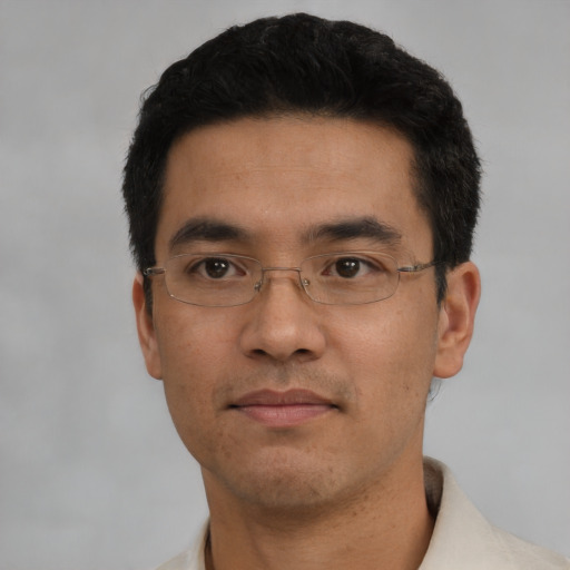 Neutral asian adult male with short  black hair and brown eyes