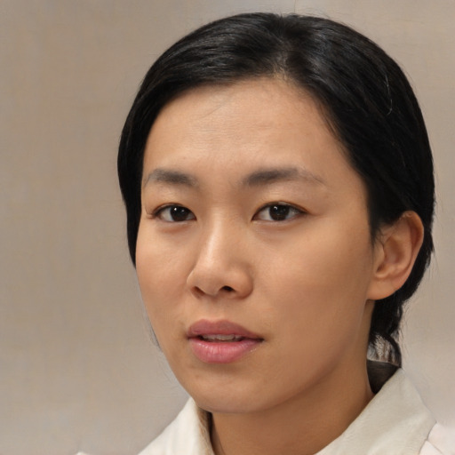 Neutral asian young-adult female with medium  black hair and brown eyes