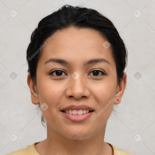 Joyful latino young-adult female with short  brown hair and brown eyes