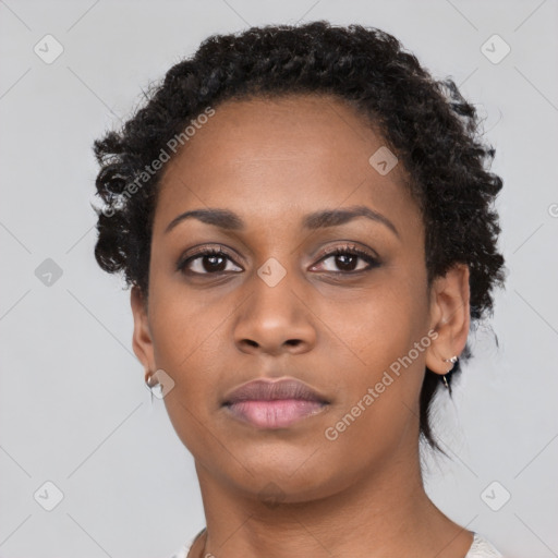 Neutral black young-adult female with short  brown hair and brown eyes