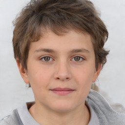 Joyful white child male with short  brown hair and brown eyes