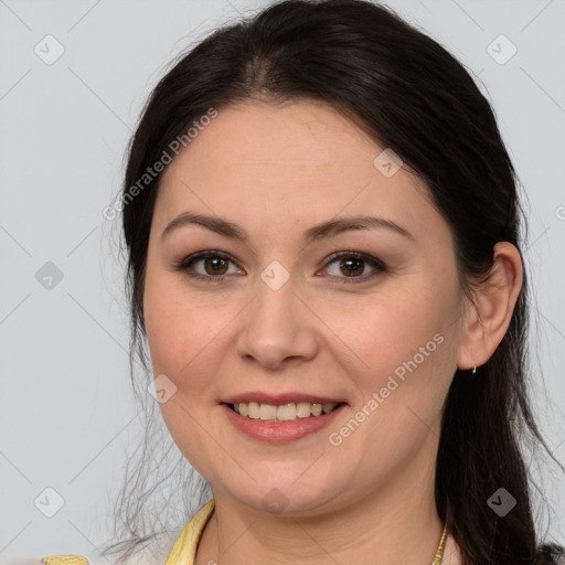 Joyful white young-adult female with long  brown hair and brown eyes