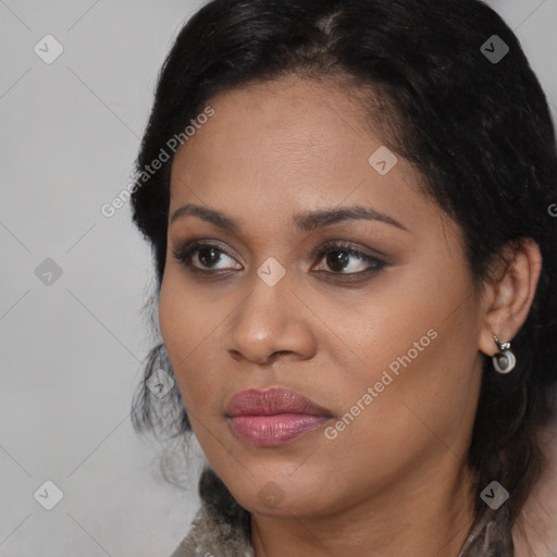 Joyful black young-adult female with medium  brown hair and brown eyes
