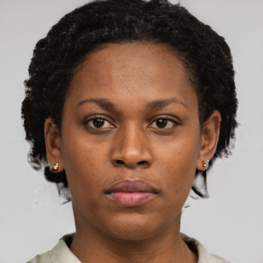 Neutral black young-adult female with short  brown hair and brown eyes