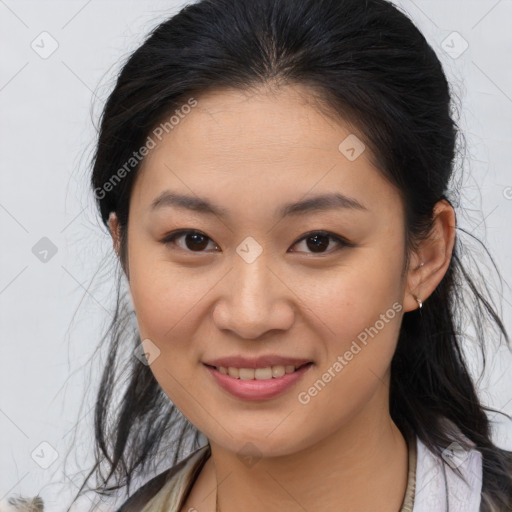 Joyful asian young-adult female with medium  brown hair and brown eyes