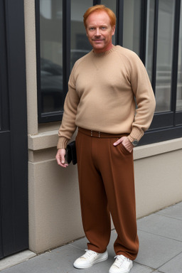 Middle-aged male with  ginger hair