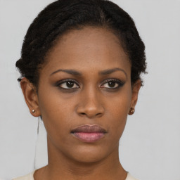 Neutral black young-adult female with short  brown hair and brown eyes