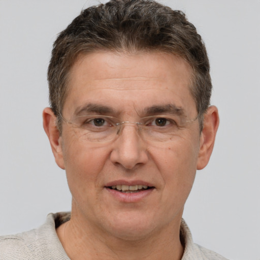 Joyful white middle-aged male with short  brown hair and brown eyes