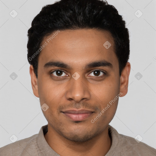 Joyful latino young-adult male with short  black hair and brown eyes