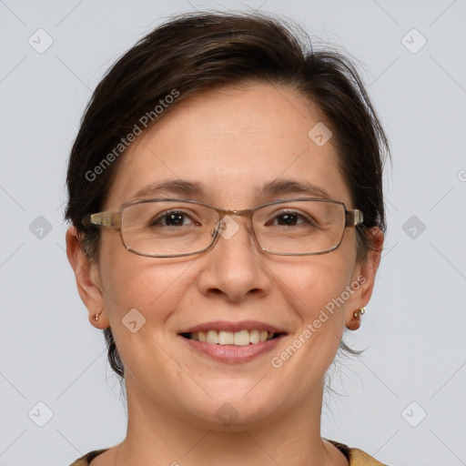 Joyful white adult female with medium  brown hair and grey eyes