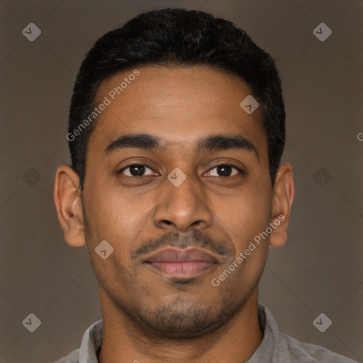 Joyful latino young-adult male with short  black hair and brown eyes