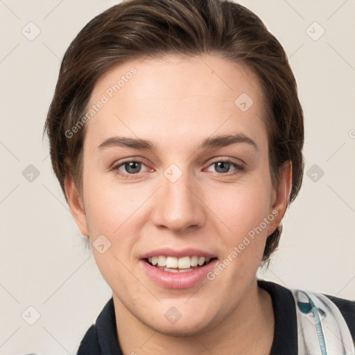 Joyful white young-adult female with medium  brown hair and grey eyes