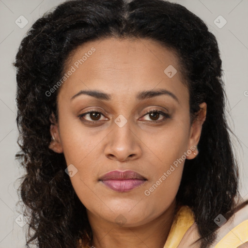 Joyful latino young-adult female with long  brown hair and brown eyes