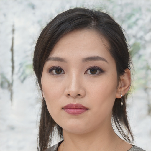 Neutral asian young-adult female with medium  brown hair and brown eyes