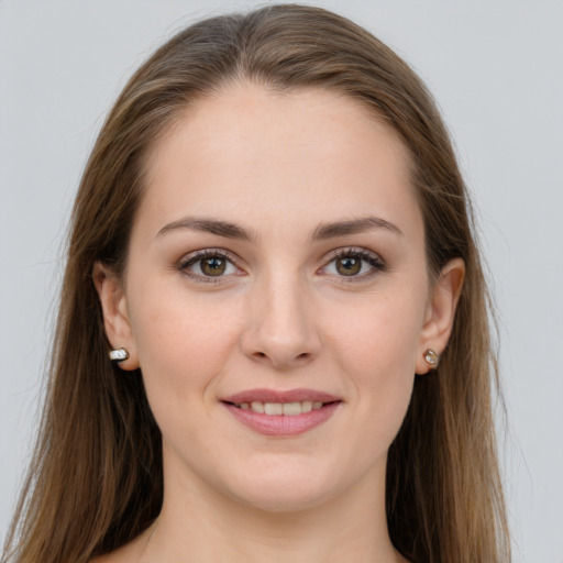 Joyful white young-adult female with long  brown hair and grey eyes