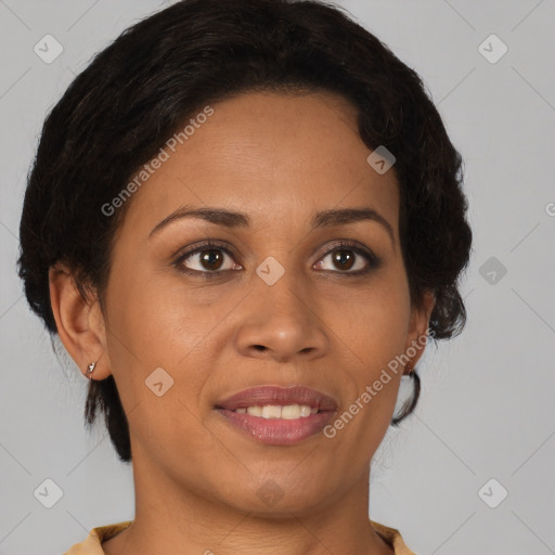 Joyful latino adult female with medium  brown hair and brown eyes