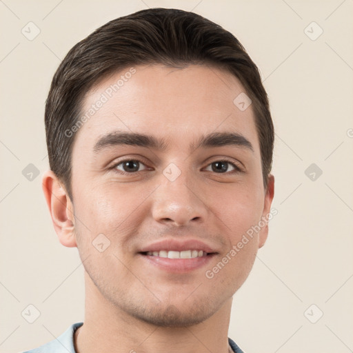 Joyful white young-adult male with short  brown hair and brown eyes