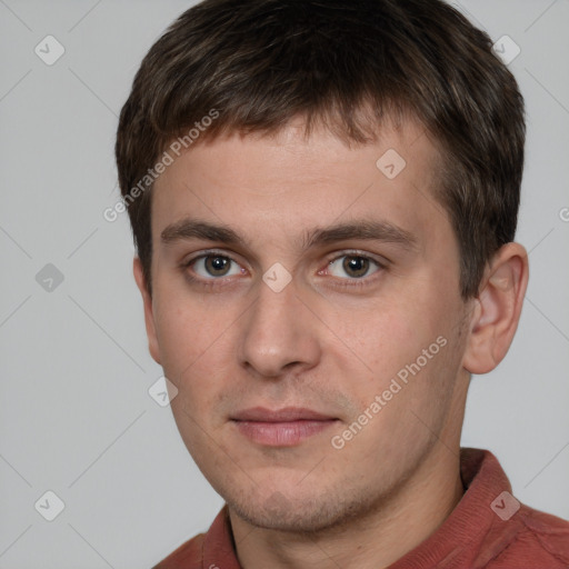 Neutral white young-adult male with short  brown hair and grey eyes