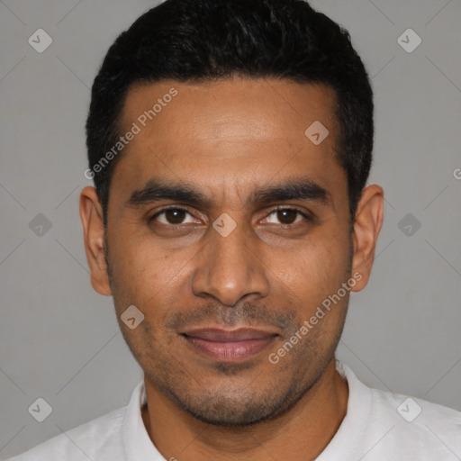 Joyful latino young-adult male with short  black hair and brown eyes