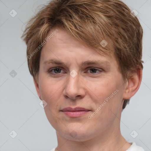 Joyful white adult female with short  brown hair and brown eyes