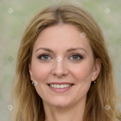 Joyful white young-adult female with long  brown hair and green eyes