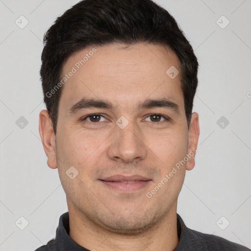 Joyful white young-adult male with short  black hair and brown eyes