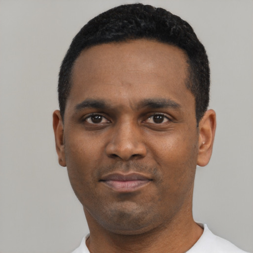 Neutral black young-adult male with short  black hair and brown eyes