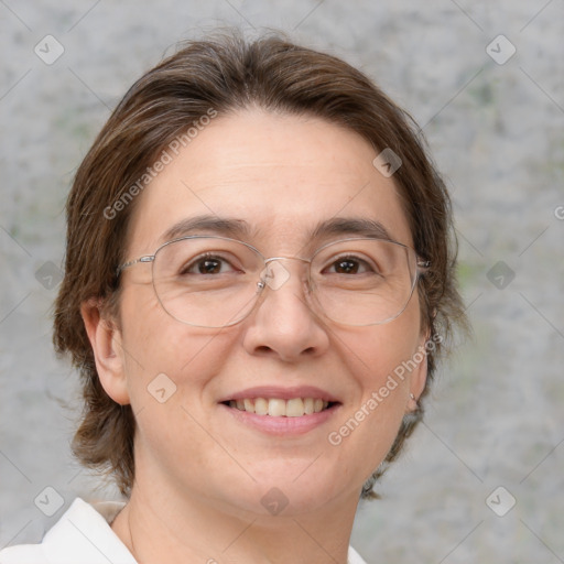 Joyful white adult female with medium  brown hair and brown eyes