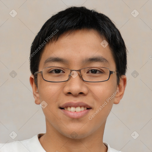 Joyful asian young-adult male with short  brown hair and brown eyes