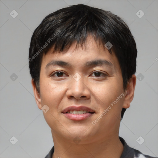 Joyful asian young-adult male with short  black hair and brown eyes