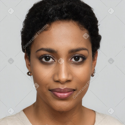 Joyful black young-adult female with short  black hair and brown eyes