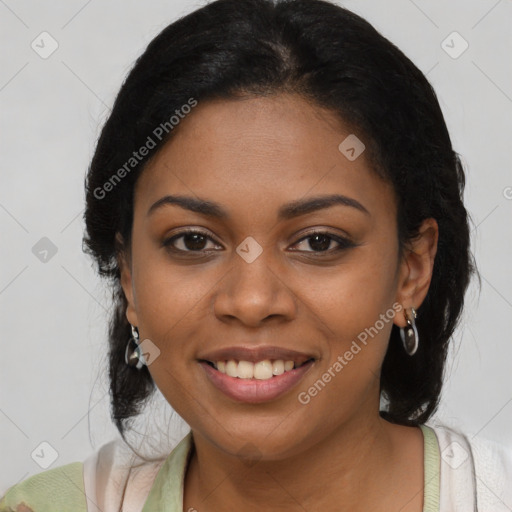 Joyful black young-adult female with medium  black hair and brown eyes