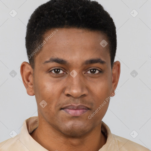 Joyful black young-adult male with short  brown hair and brown eyes